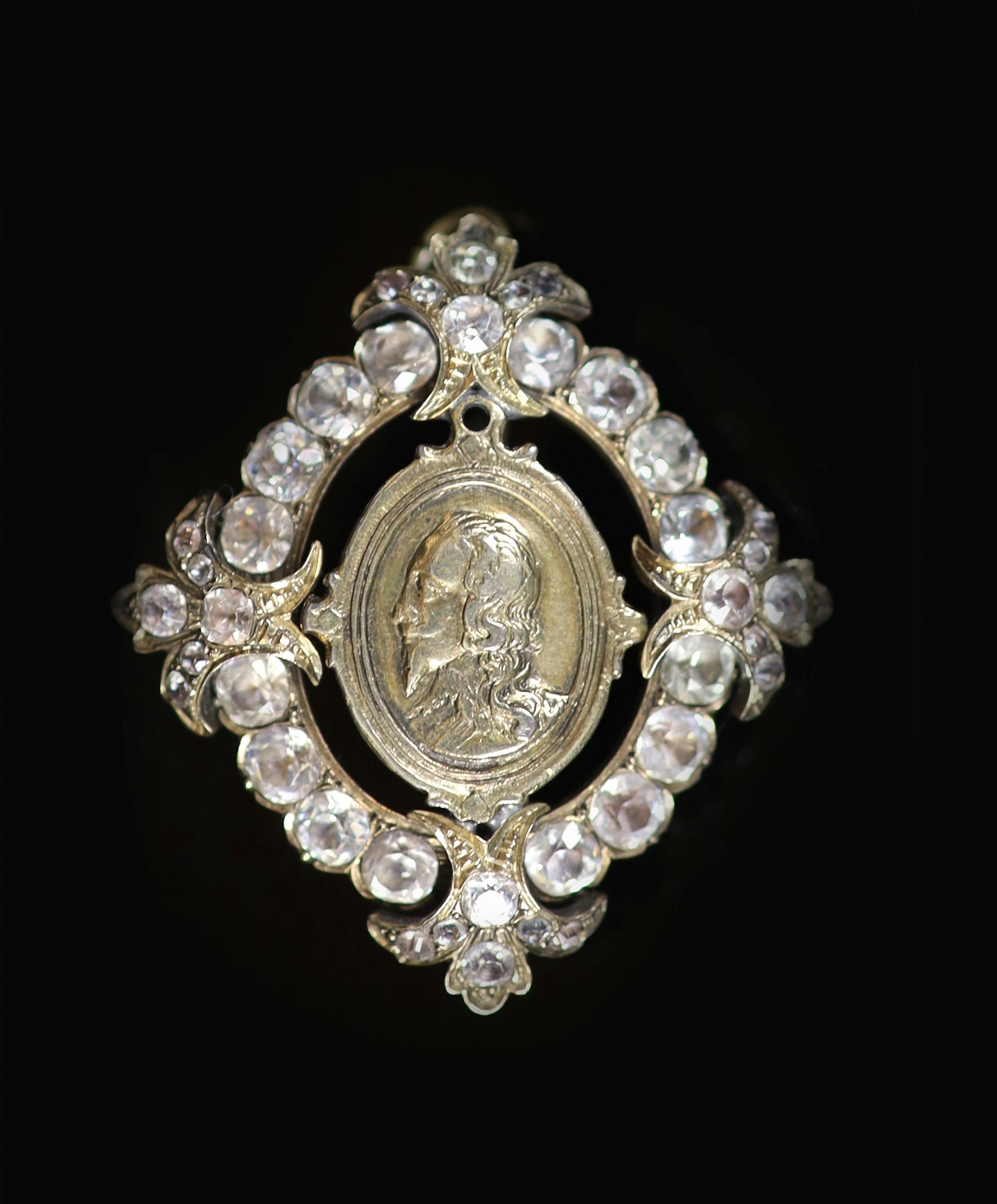 A Victorian paste and silver brooch inset with a portrait of Charles I 4.5 x 4cm.
